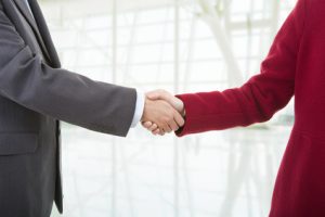 business people shake hands after meeting